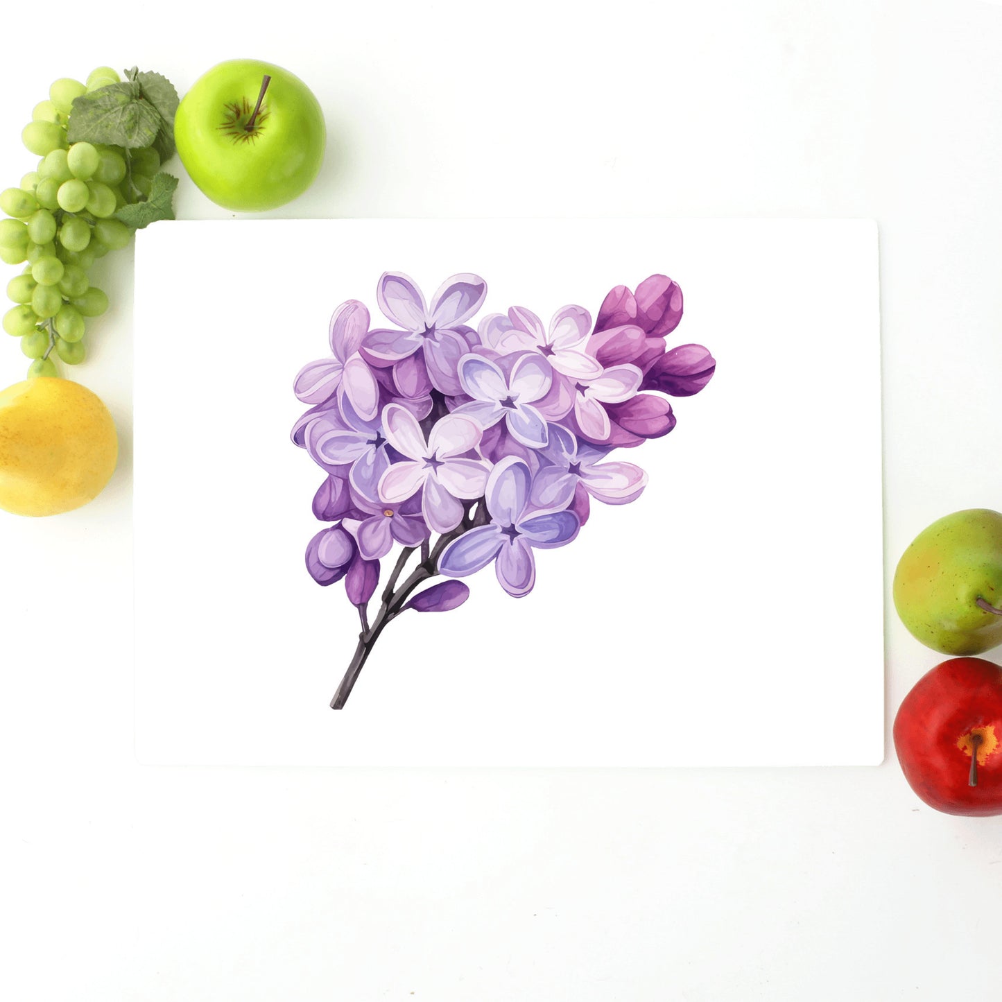 Lilac flowers on glass cutting board for gift