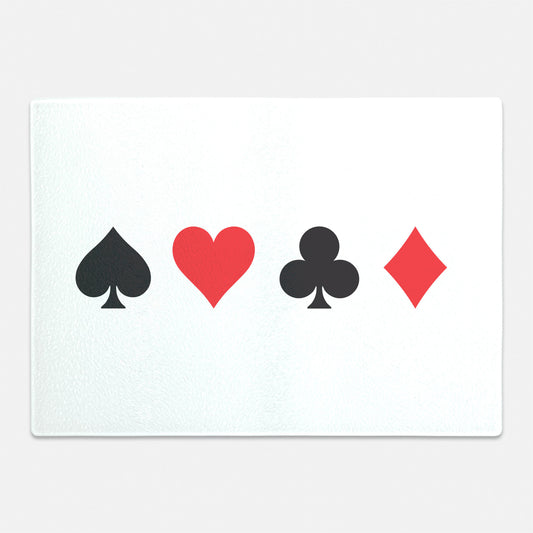 Playing card suits on glass cutting board for gift