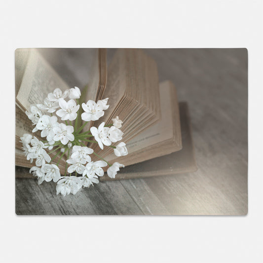 Vintage book with flowers printed on glass cutting board for gift